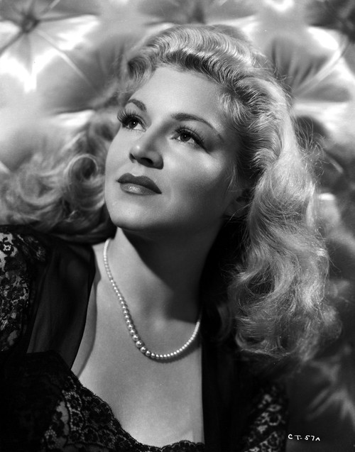 Claire Trevor Looking Up in Black Dress with Necklace Photo Print - Item # VARCEL705261