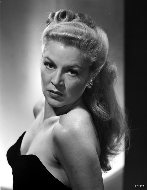 Claire Trevor Posed Sideways in Black Strapless Dress Photo Print - Item # VARCEL705241