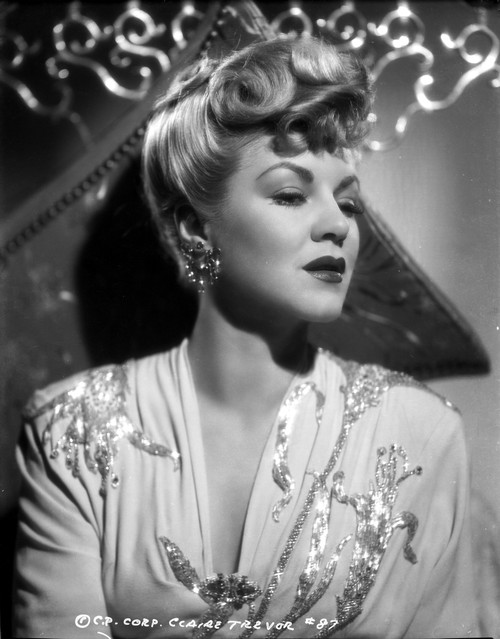 Claire Trevor Looking Away in Floral Dress Portrait Photo Print - Item # VARCEL705271