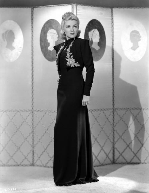 Claire Trevor standing in Black Dress Photo Print - Item # VARCEL705243