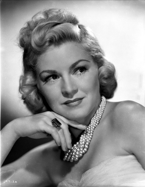 Claire Trevor Looking Away in White with Pearl Necklace Photo Print - Item # VARCEL705255