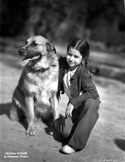 Virginia Weidler Kneeling with Dog Photo Print - Item # VARCEL705438