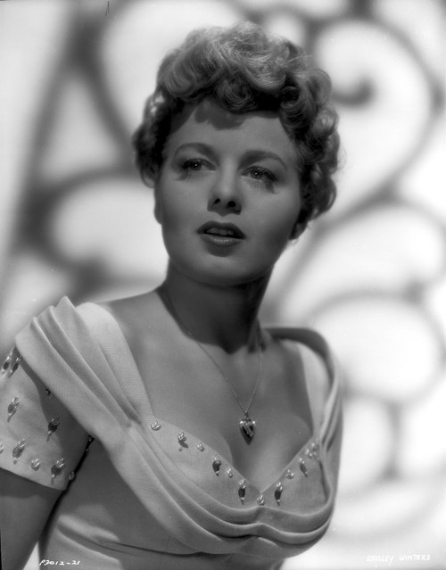 Shelley Winters wearing a Scoop-Neck Gown and Necklace in a Classic Portrait Photo Print - Item # VARCEL705540