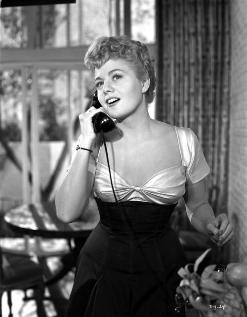 Shelley Winters wearing a Scoop-Neck Dress and Answering the Phone in a Classic Portrait Photo Print - Item # VARCEL705583