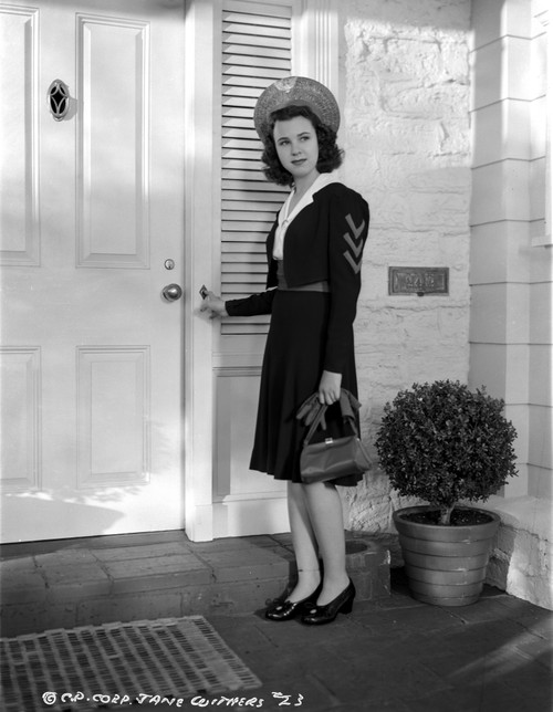 Jane Withers Posed in Black Velvet Long Sleeve Dress with White Collar Photo Print - Item # VARCEL705623