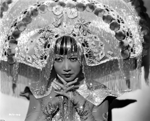 Anna Wong wearing a Glittering Costume and Headdress Photo Print - Item # VARCEL705673