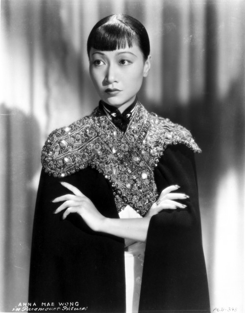 Anna Wong wearing a Glittering Black Garment Photo Print - Item # VARCEL705685