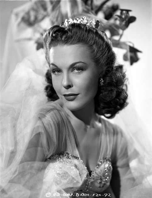 Joan Woodbury Looking at the Camera while Showing a Little Smile Photo Print - Item # VARCEL705725