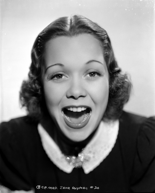 Jane Wyman Portrait in White Collar and Black Velvet Short Sleeve Dress with Mouth Opened Photo Print - Item # VARCEL705823