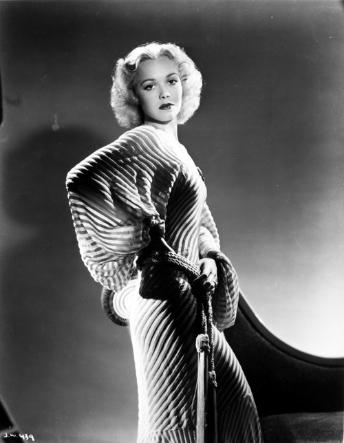 Jane Wyman Posed in White Strip Corduroy Bell Long Sleeve Silk Dress with Hands on the Waist Photo Print - Item # VARCEL705825