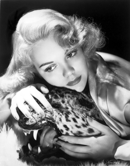 Jane Wyman Portrait in Shiny Silk Dress with Head Leaning on a Tiger Figurine Photo Print - Item # VARCEL705813