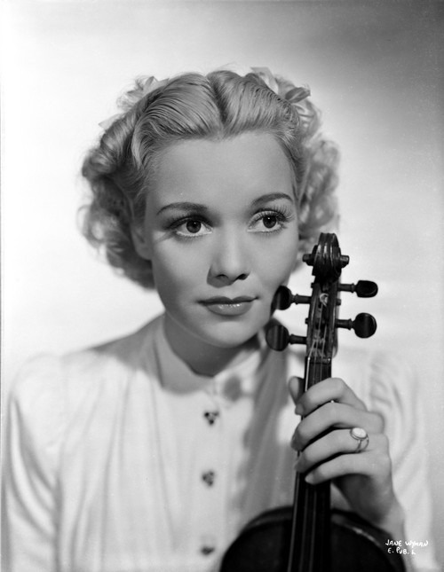 Jane Wyman Portrait in White Long Sleeve Shirt with Hand Holding a Violin Photo Print - Item # VARCEL705851
