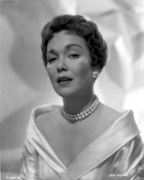 Jane Wyman Portrait in White Silk V-Neck Long Sleeve Shoulder Dress and Pearl Necklace with Pearl Earring Photo Print - Item # VARCEL705896