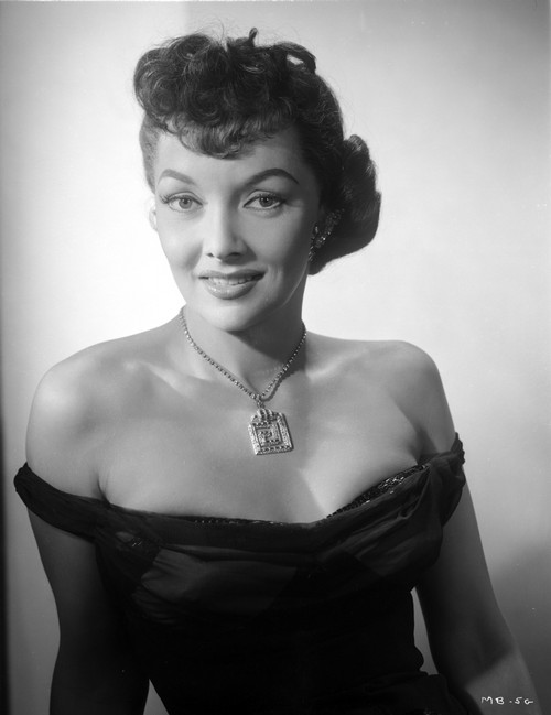 Mari Blanchard smiling in Black Dress with Necklace Photo Print - Item # VARCEL706044