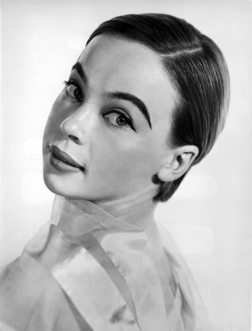 Leslie Caron posed on Side Ways in White Background Photo Print - Item # VARCEL706076