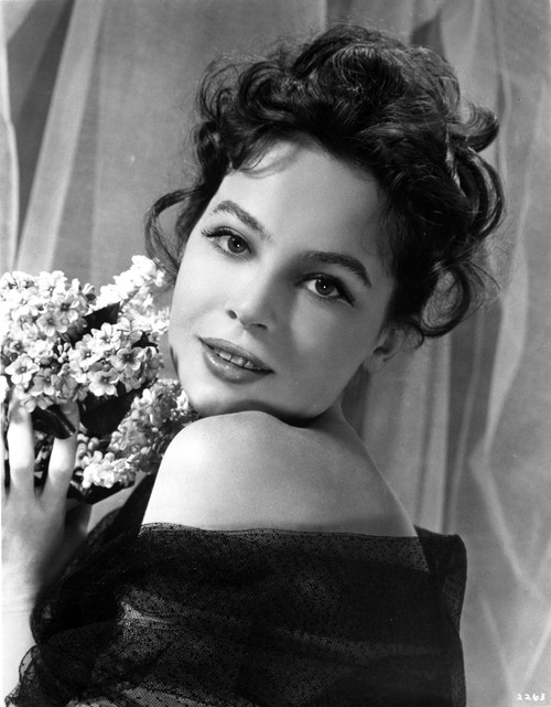 Leslie Caron Portrait in Classic with A Bouquet of Flowers Photo Print - Item # VARCEL706078