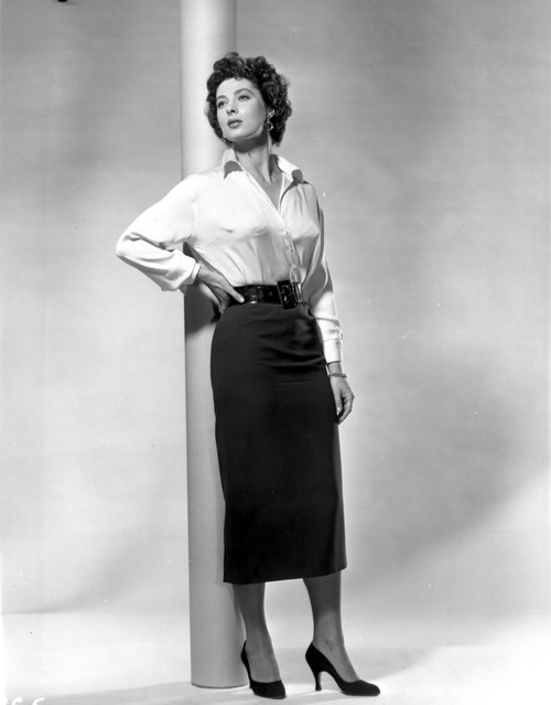 Rita Gam Leaning on Post with Hand on Hip Photo Print - Item # VARCEL706116