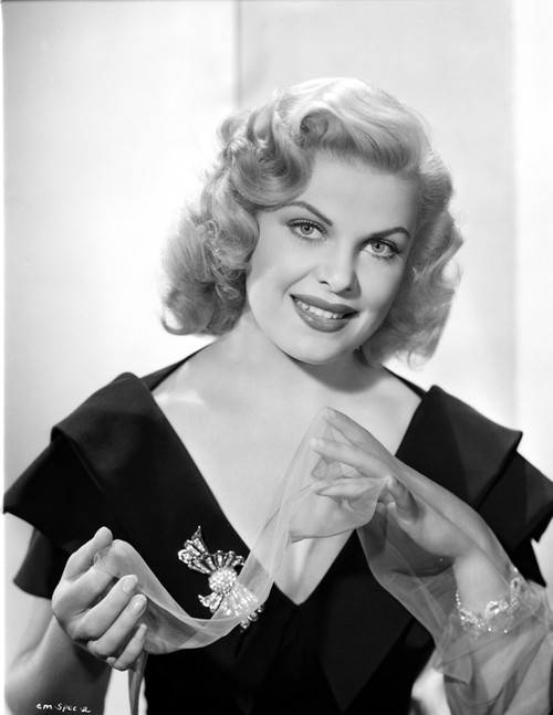 Cleo Moore smiling in Black Dress with Bracelet Photo Print - Item # VARCEL706406