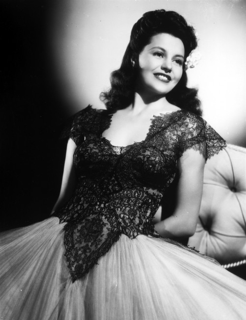 Cyd Charisse Looking Away in Black Dress with a Smile Photo Print - Item # VARCEL706471