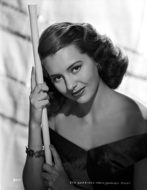Cyd Charisse Posed in Black Dress with Bracelet Photo Print - Item # VARCEL706447