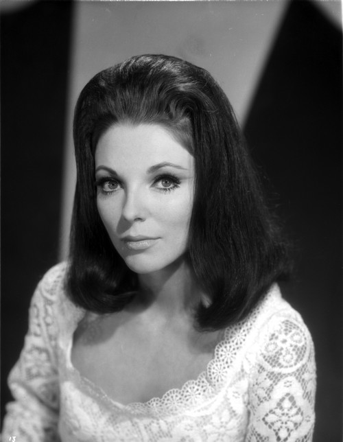 Joan Collins wearing a White Loop Neck Dress Photo Print - Item # VARCEL706473