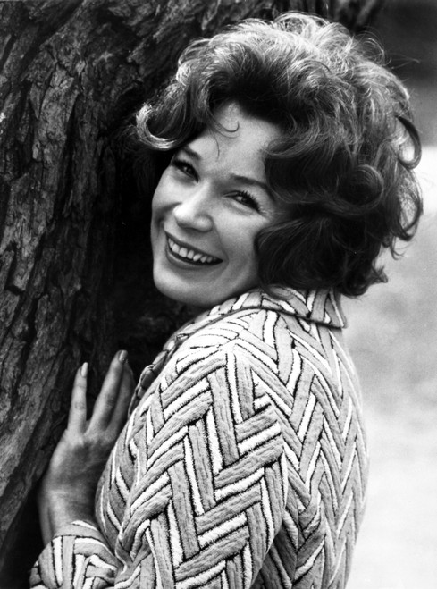 Shirley MacLaine Leaning and smiling on Tree Photo Print - Item # VARCEL706632