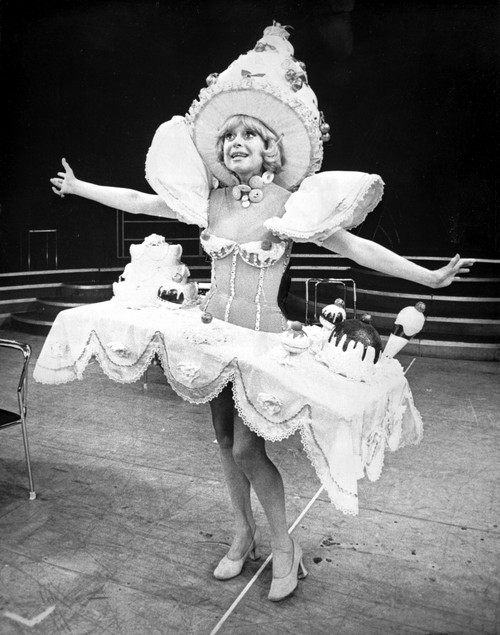 Carol Channing wearing a White Puff Sleeve Dress Photo Print - Item # VARCEL706731