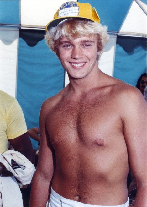 John Schneider wearing a Yellow Cap while Topless Photo Print - Item # VARCEL706897