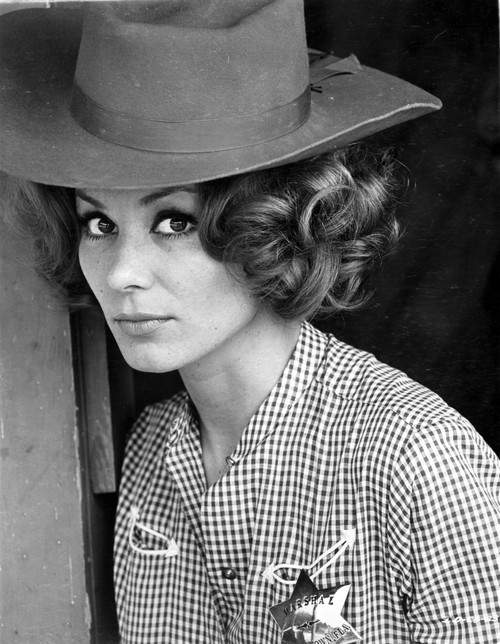 Irina Demick in a Checkered Blouse Photo Print - Item # VARCEL706944