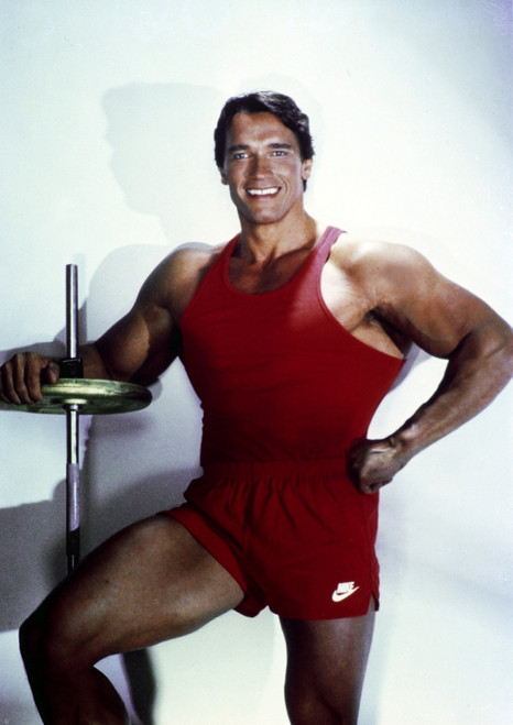 Arnold Schwarzenegger posed in Red Gym Outfit Photo Print - Item # VARCEL706917