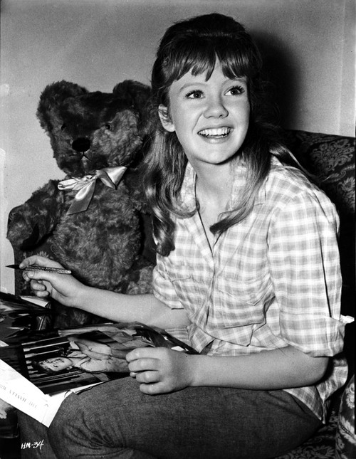 Hayley Mills wearing a Checkered Polo Shirt with Stuffed Toy Photo Print - Item # VARCEL707011