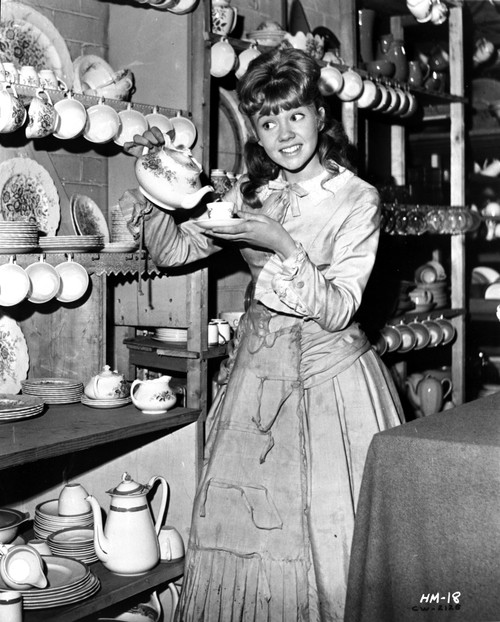 Hayley Mills wearing a Dress and Pouring a Tea in a Cup Photo Print - Item # VARCEL707054