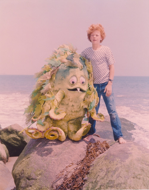 Sigmund and the Sea Monster Standing on A Rock in the Sea with the Sea Monster in A Movie Scene Photo Print - Item # VARCEL707136