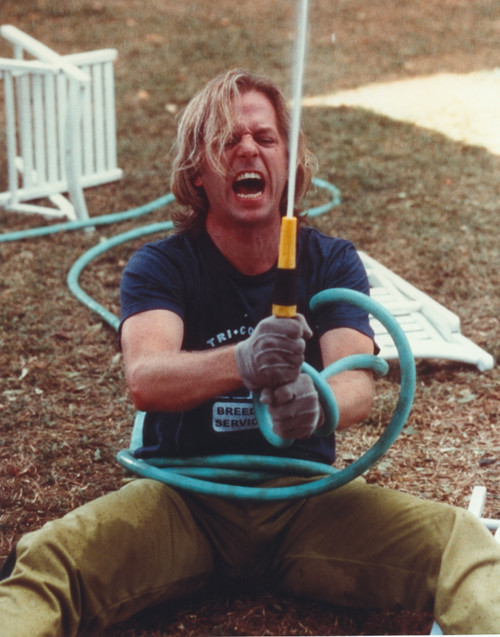 David Spade Holding a Water Hose Photo Print - Item # VARCEL707390