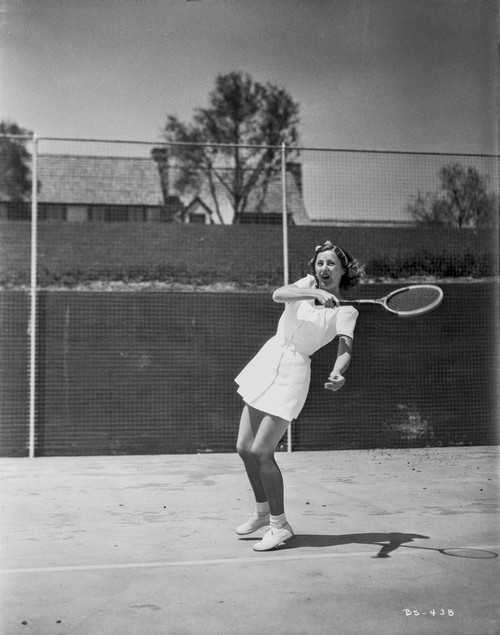 Barbara Stanwyck Playing Tennis in Classic Portrait Photo Print - Item # VARCEL707495