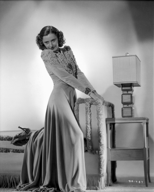 Lola Albright smiling in a Dress and Black Shoes, and Hands on Waist Photo Print - Item # VARCEL707527