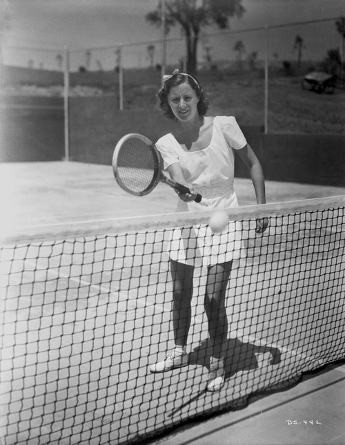 Black and White Portrait of Barbara Stanwyck Playing Tennis Portrait Photo Print - Item # VARCEL707508