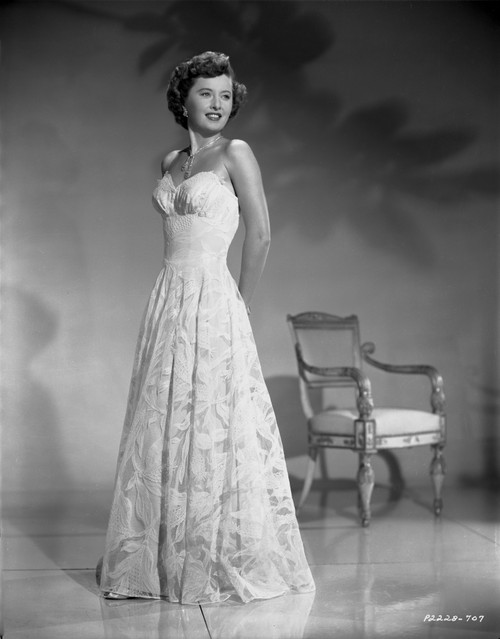 Barbara Stanwyck standing in Long Gown Classic Portrait Photo Print - Item # VARCEL707553