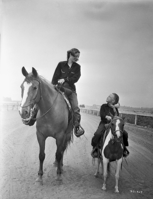 Black and White Portrait of Barbara Stanwyck Riding a Horse Portrait Photo Print - Item # VARCEL707563