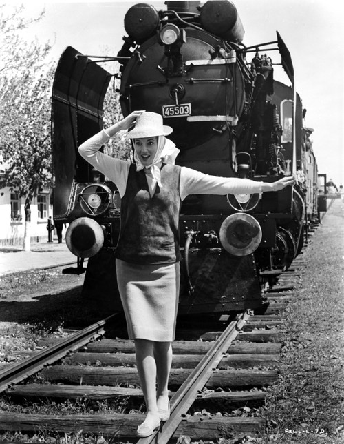 Daniela Bianchi standing on a Railroad Photo Print - Item # VARCEL707577