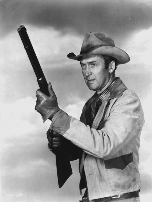 James Stewart Posed in White Jacket and Cowboy Hat while Holding a Rifle Photo Print - Item # VARCEL707873