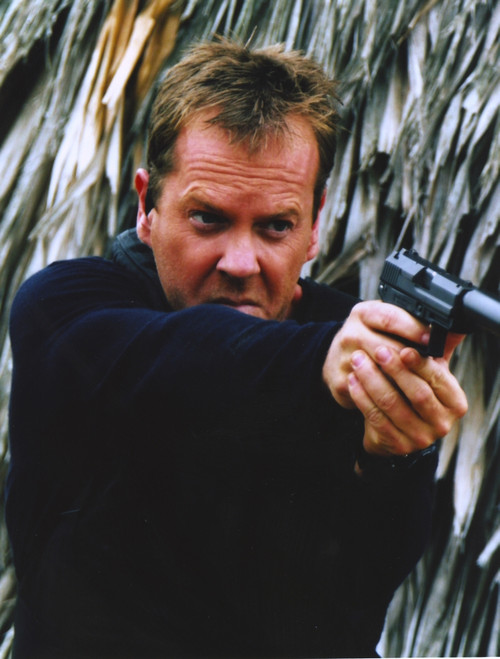 Kiefer Sutherland Pointing a Gun Portrait Photo Print - Item # VARCEL708141