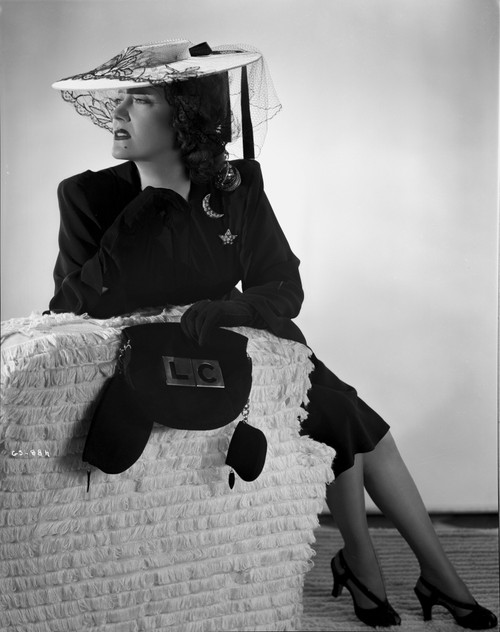 Gloria Swanson sitting in Side View Classic Portrait Photo Print - Item # VARCEL708161