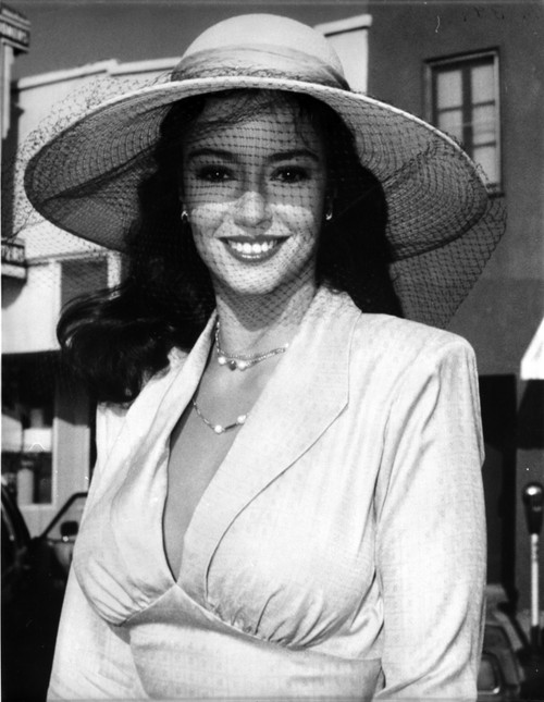 A Portrait Of Rachel Ward Wearing A Netted Sun Hat Outdoors Photo Print