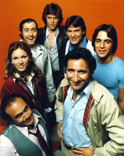 Taxi A Lady and Six Men smiling on Orange Background Photo Print - Item # VARCEL708271