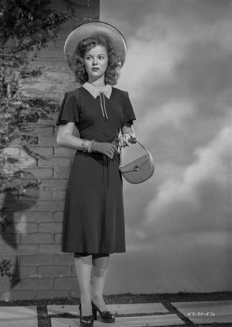 Shirley Temple wearing a Black Dress with Matching Hat Photo Print - Item # VARCEL708473