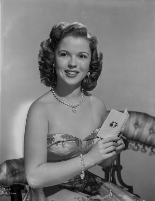 Shirley Temple Posed in Floral Dress Photo Print - Item # VARCEL708488
