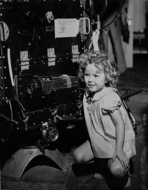 Shirley Temple Squatting in Dress Photo Print - Item # VARCEL708522