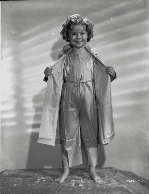 Shirley Temple wearing a Dressing Gown in a Portrait Photo Print - Item # VARCEL708576