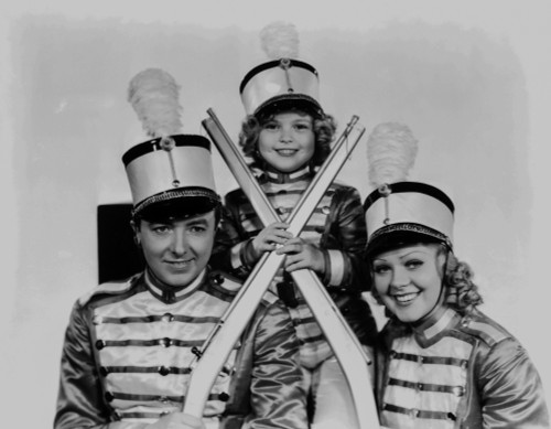 Shirley Temple Taking a Group Picture wearing a Guard Outfit Photo Print - Item # VARCEL708593